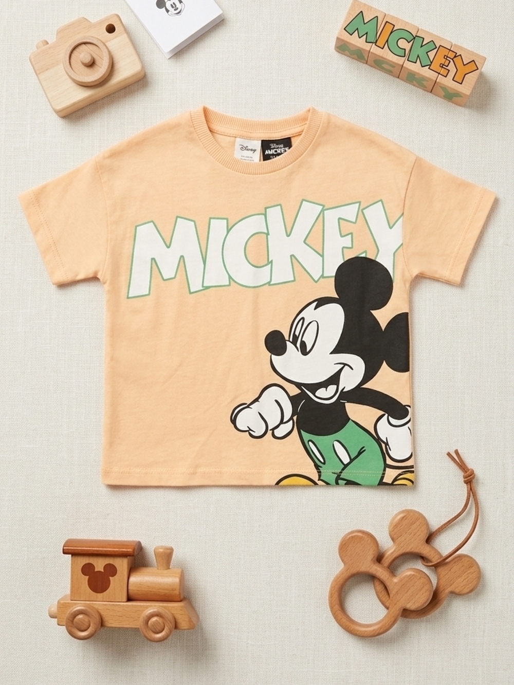 Disney Peach Mickey Graphic Tee with Green Accents